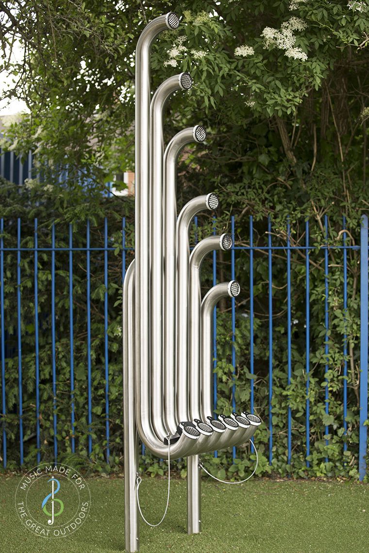 large silver outdoor aerophones or slap tubes in school playground